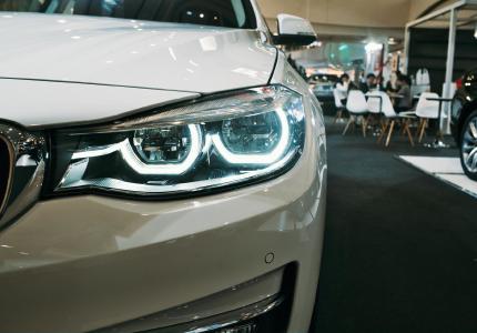 Photo of a car in a showroom 